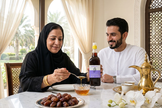 Emirati grandmother measuring black seed oil at a Dubai breakfast table, a scene for the question what is black seed oil good for