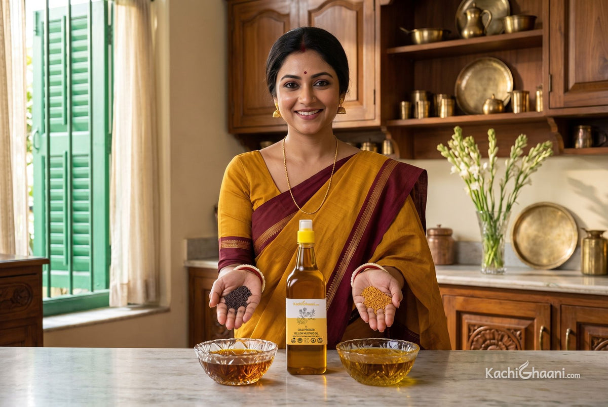Bengali woman holding black and yellow mustard seeds over two bowls of oil, showing yellow mustard oil vs black mustard oil